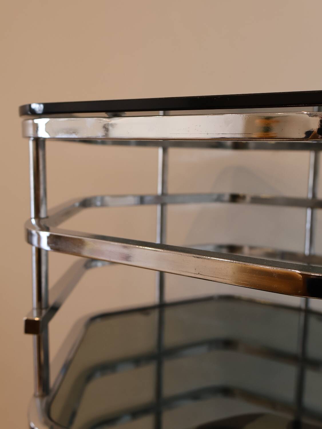 Chrome and smoked glass dressing table with a nesting seat, 1970.