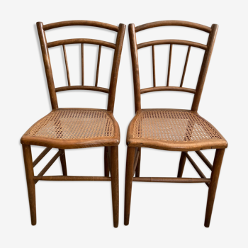 Lot de 2 chaises bistrot en bois anciennes assises cannées