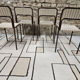 Set of 4 vintage stackable chairs 1980