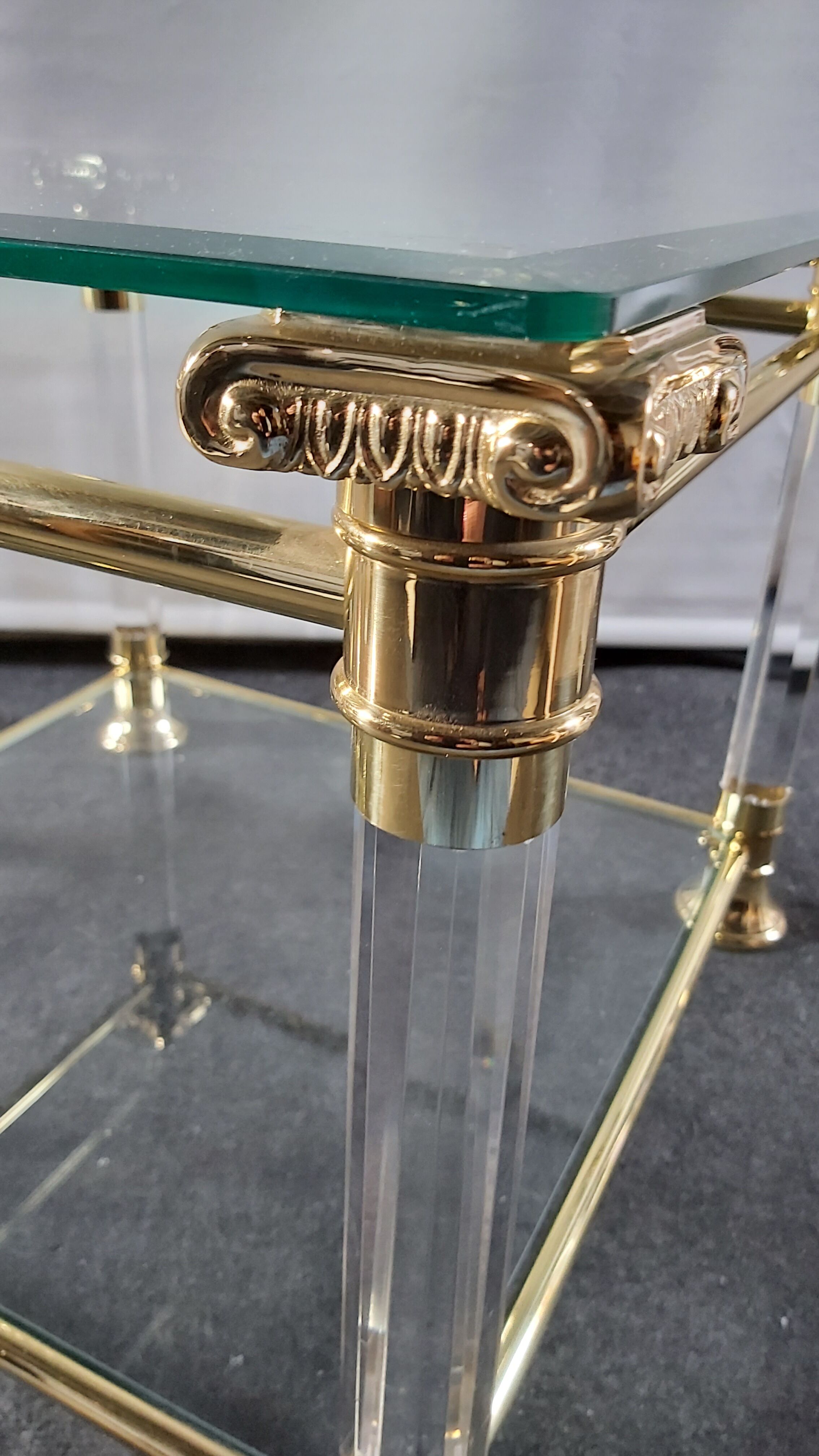 Pair of tables in brass, acrylic and glass