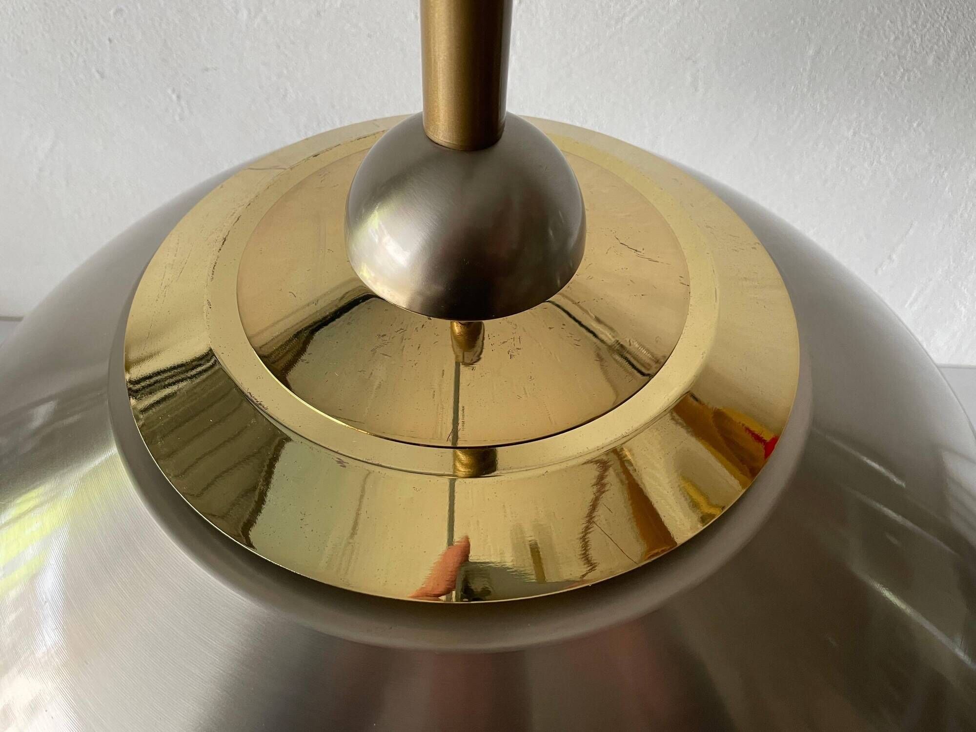 Suspended lamp in chrome and gold metal by TZ, 1970s, Germany.