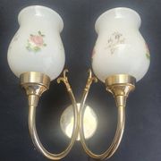 Pair of vintage wall sconces in gilded brass and pink opaline glass.