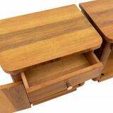 Vintage wooden bedside tables from the mid-20th century, after renovation.