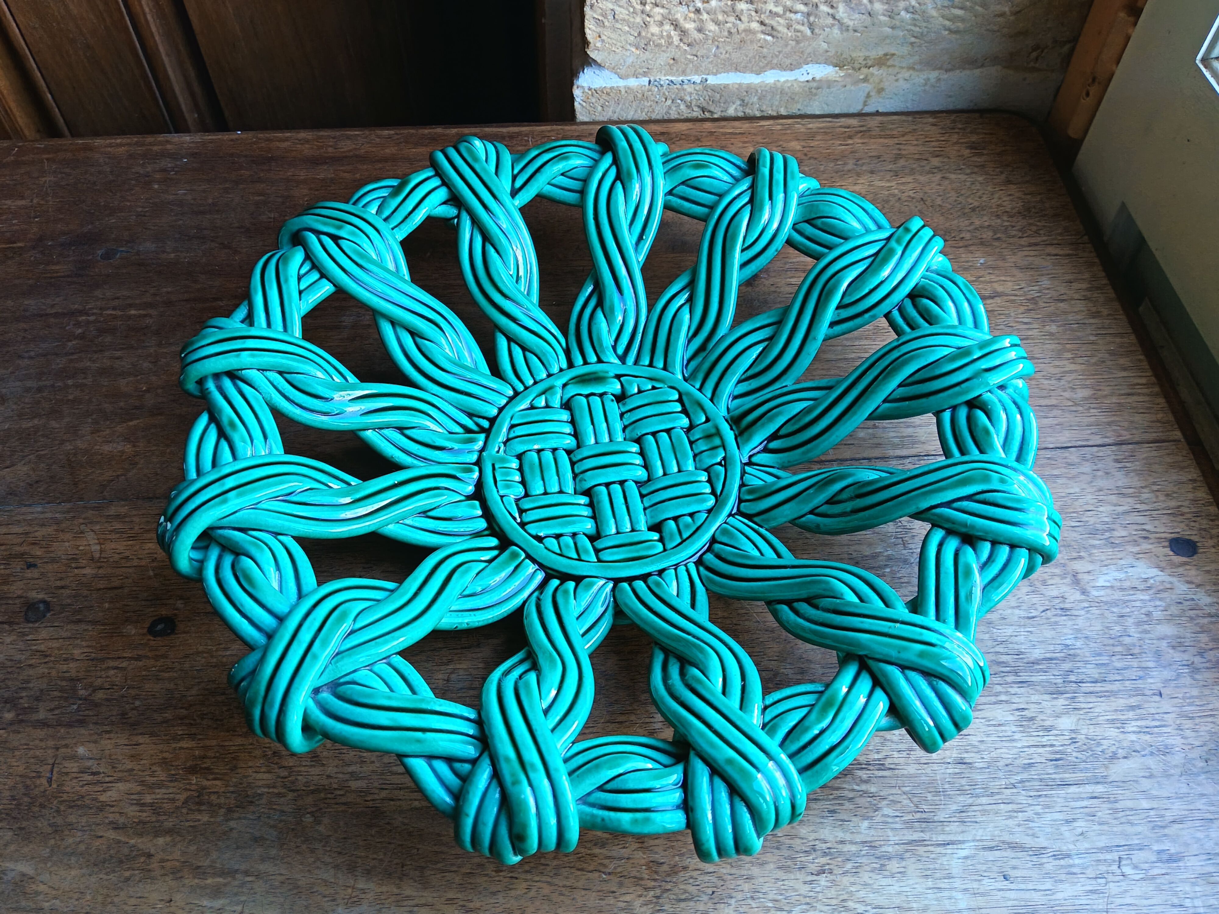 Woven green ceramic basket