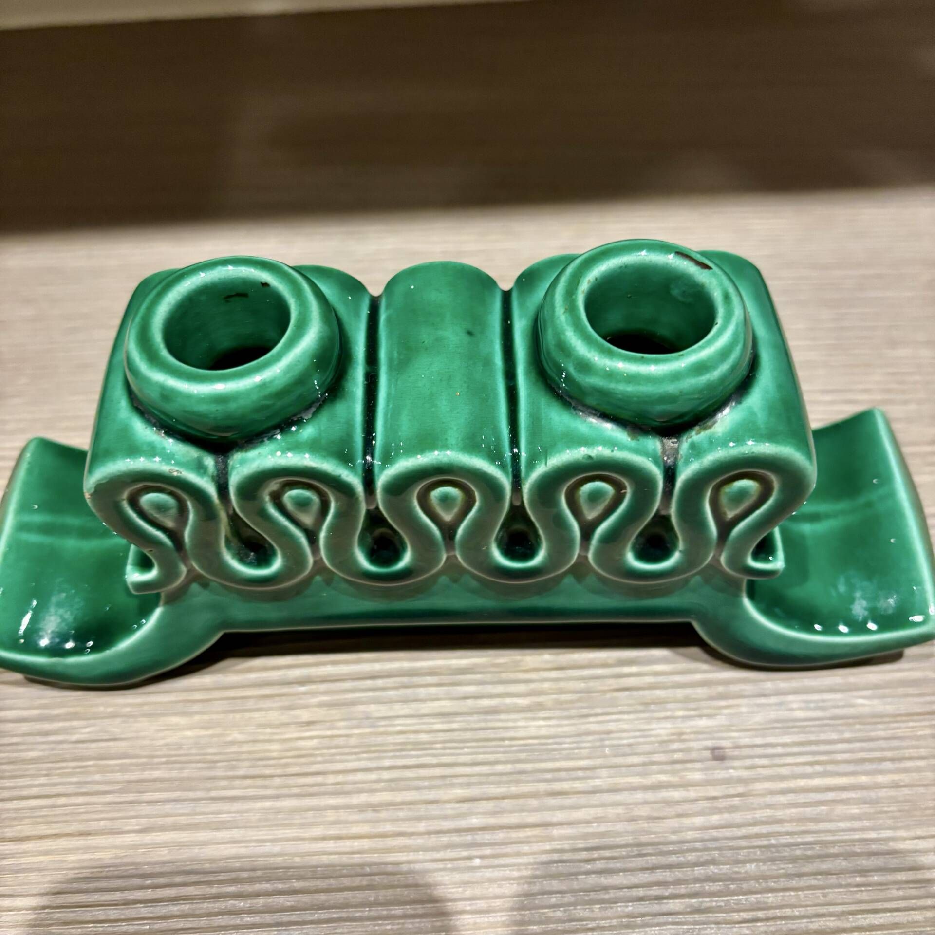 Pair of Art Deco green ceramic candlesticks