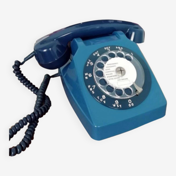 Téléphone bleu rotatif