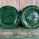 Pair of green slip plates with leaf decoration, 19th century