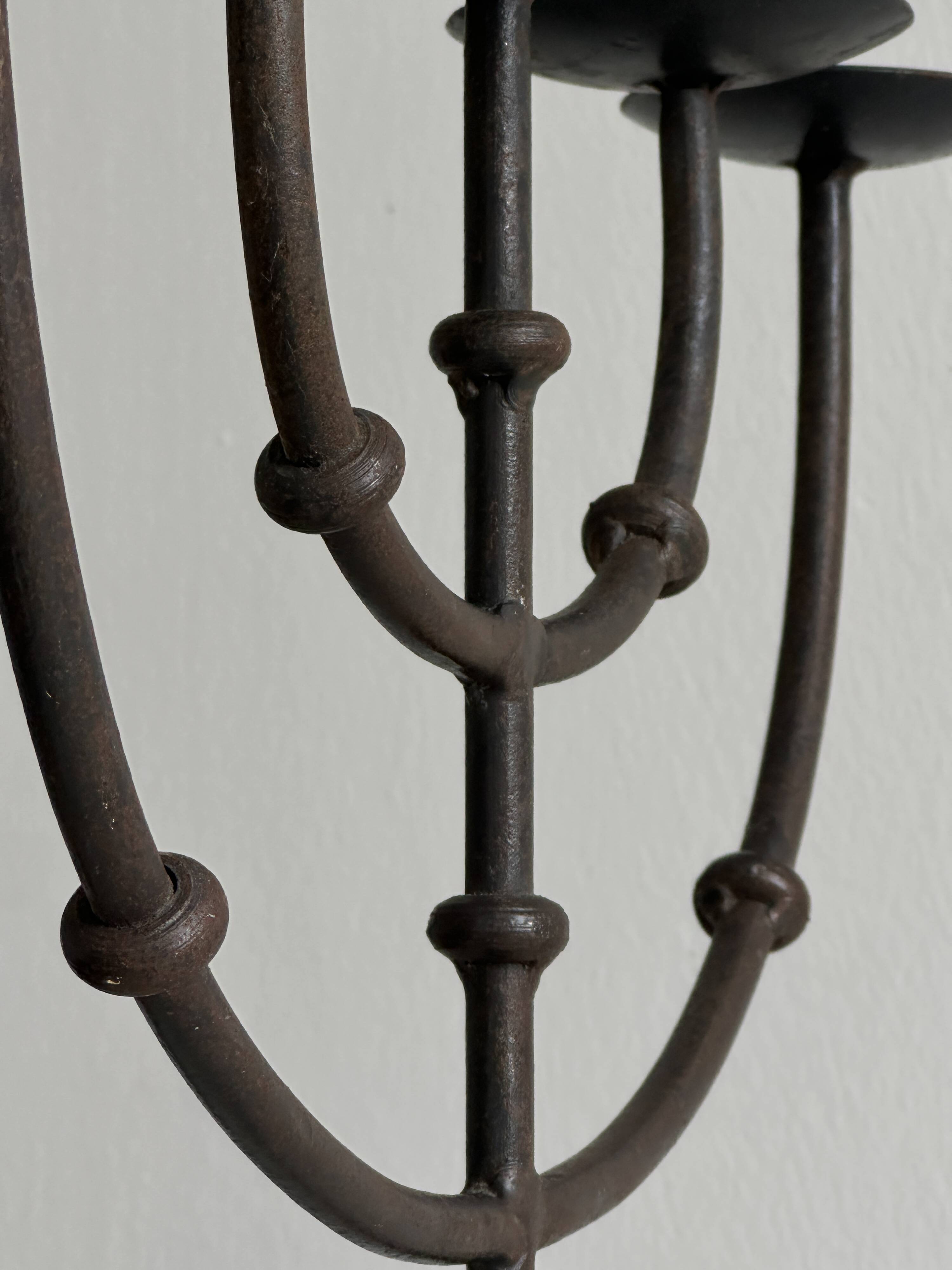 5-arm black metal candlestick