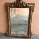 Napoleon-style mirror with a pediment
