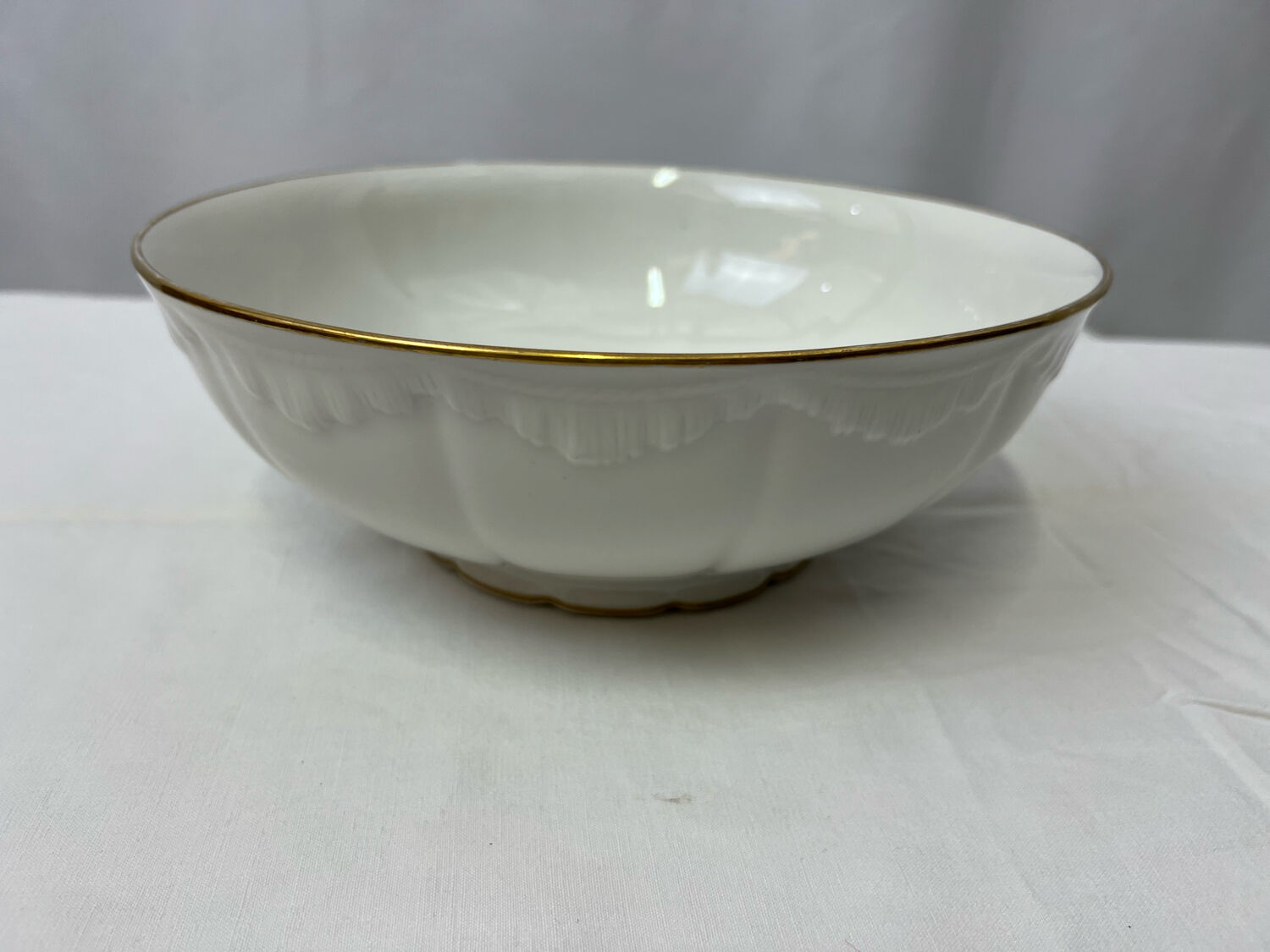 White and golden salad bowl