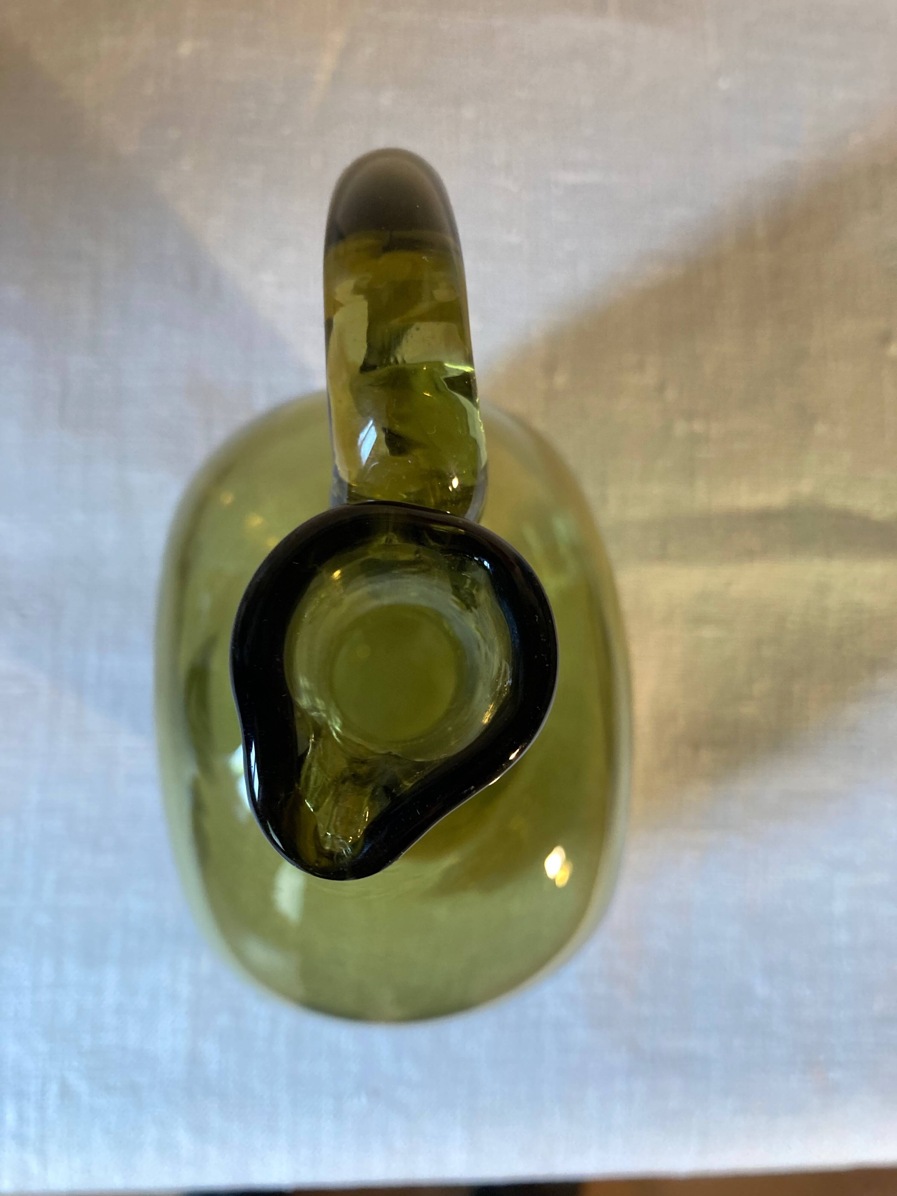 Green blown glass carafe