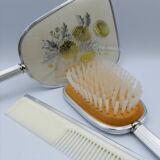 Ensemble Miroir à main, peigne et brosse.