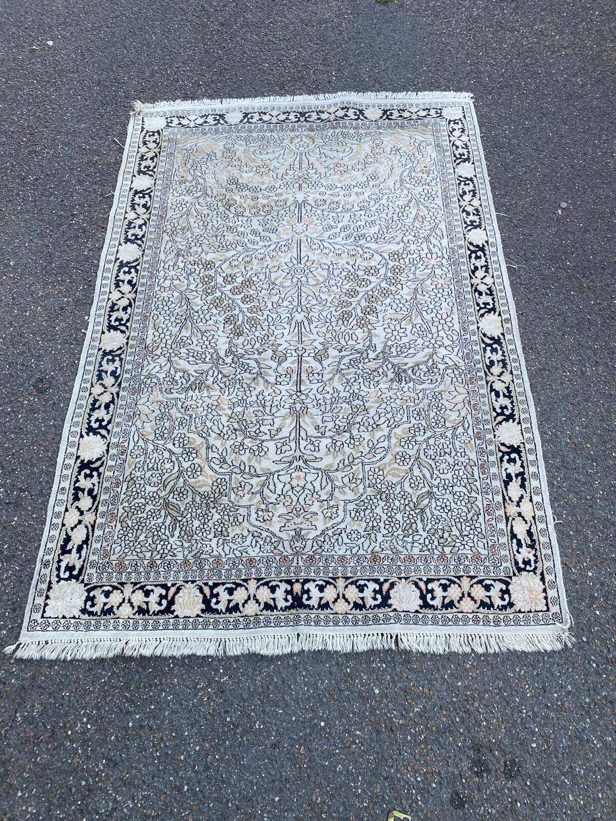 Handmade beige wool Persian rug 130x200