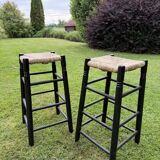 Set of 2 black wooden bar stools with rush seat from the 70s and 80s