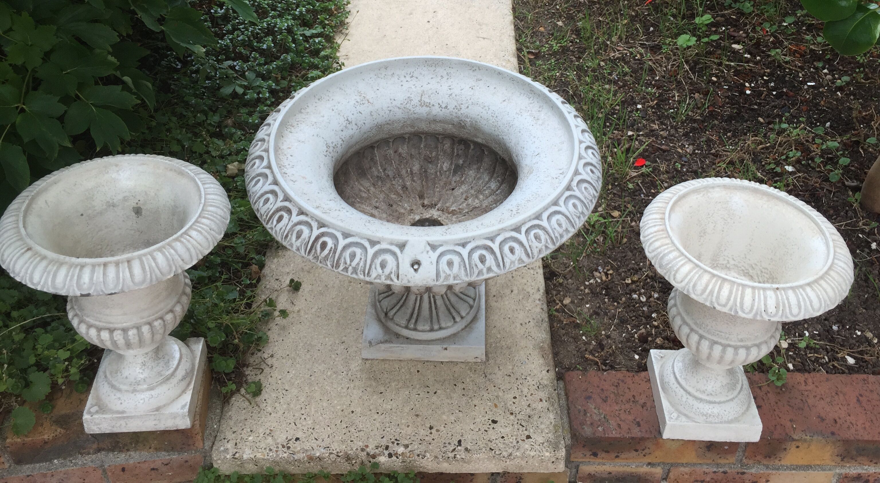 Set of planters: clasp and cast iron pots