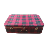 Vintage suitcase covered with scottish fabrics
