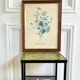 Vintage botanical board frame with blue flowers