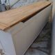 Craft furniture enhanced in pearl gray, shelves and top in raw wood.