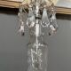 Venetian chandelier decorated with clear crystal and rare coloured crystal.