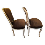 A pair of Louis XV style armchairs in wood and velvet fabrics