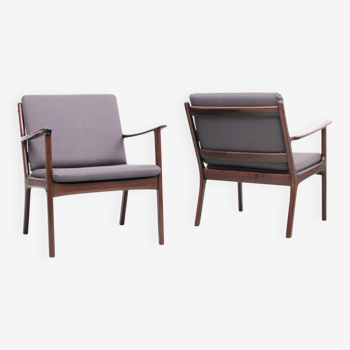 Pair of Scandinavian mahogany armchairs model PJ 112