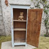 Old patinated bonnet maker