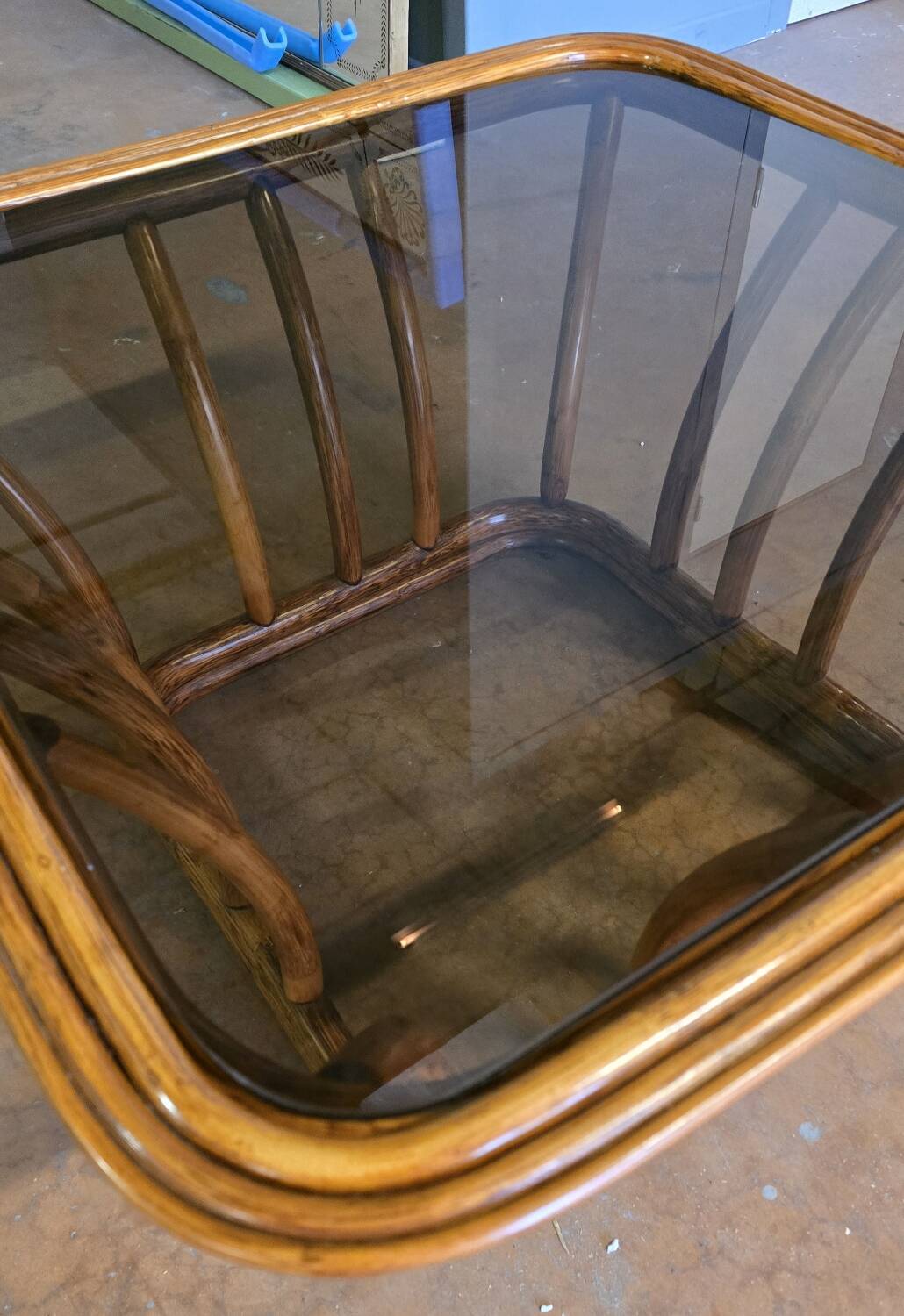 Rattan and smoked glass coffee table, vintage 1970s design.