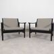 2x wooden Scandinavian arm chairs