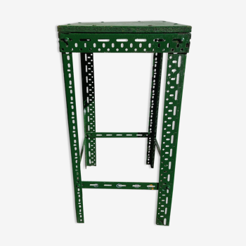 Green metal stool, pedestal table