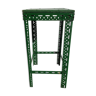 Green metal stool, pedestal table