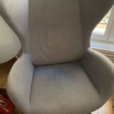 Armchair with pouf