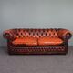 Chesterfield sofa in patinated orange leather, 2.5 seats
