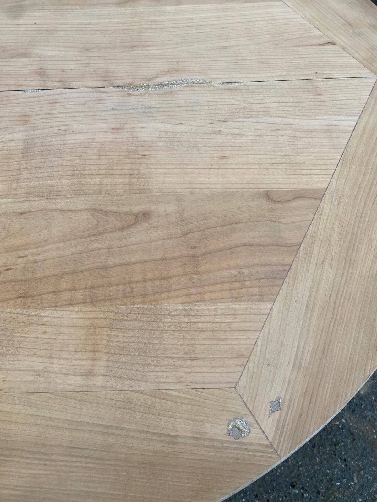 Round extendable dining table with a central pedestal base, renovated in raw wood, 150cm