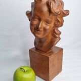 Bust of a laughing child in patinated plaster, 35 cm
