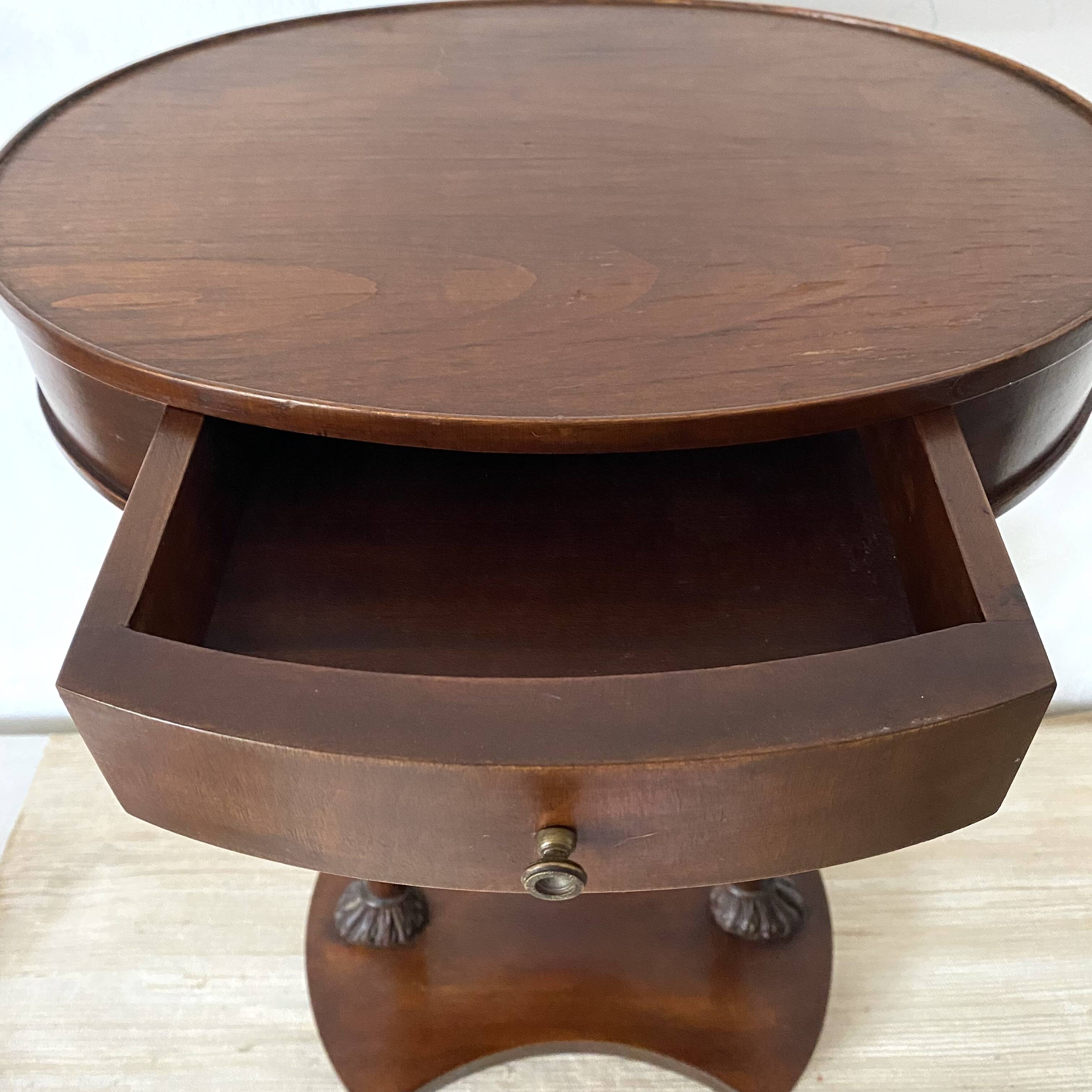 Empire style swan neck and lion paw pedestal table