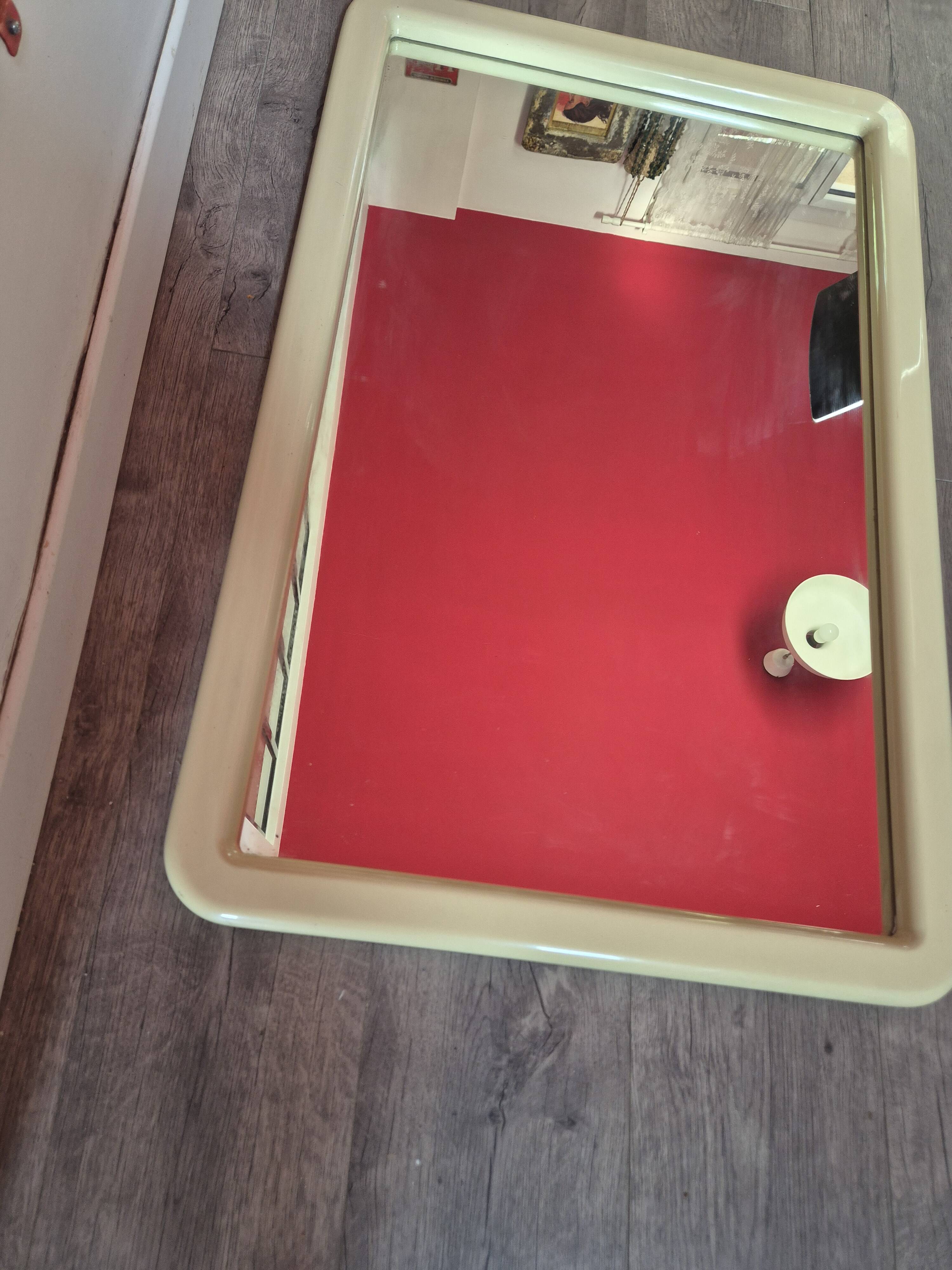 vintage mirror from the 70s with a large beige border, 90 by 60 cm
