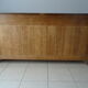 Very much in solid walnut, 3 doors.
