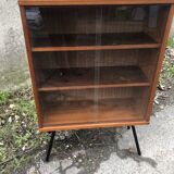 Library showcase with sliding glass doors 60s