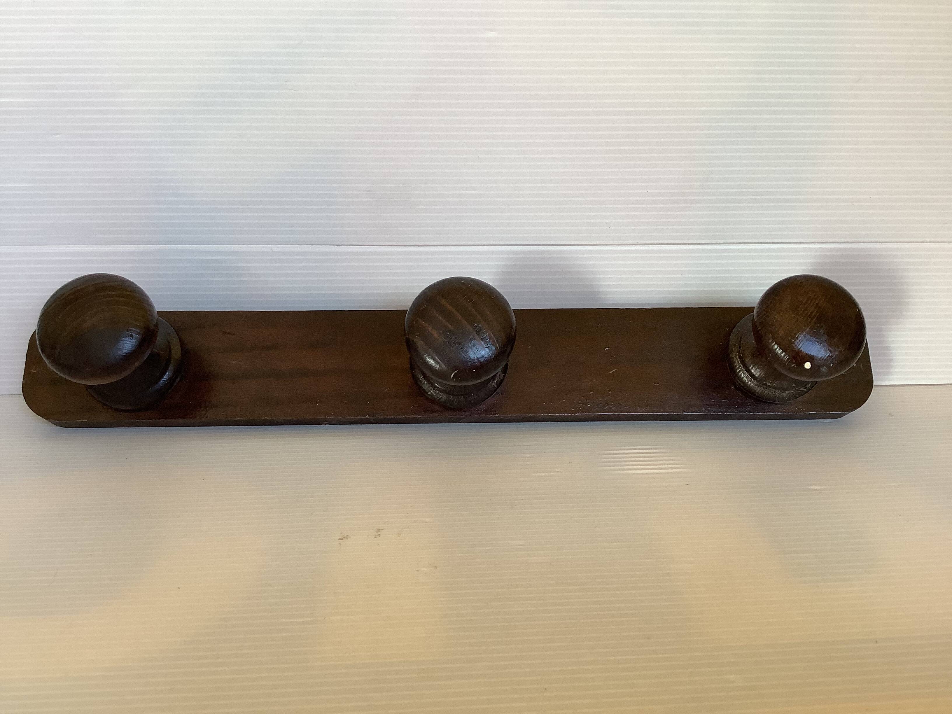 Dark wood coat rack