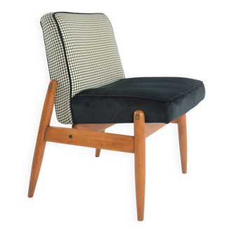 Black and white armchair without armrests
