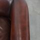 Set of two cow leather club armchairs in a luxurious red/brown colour