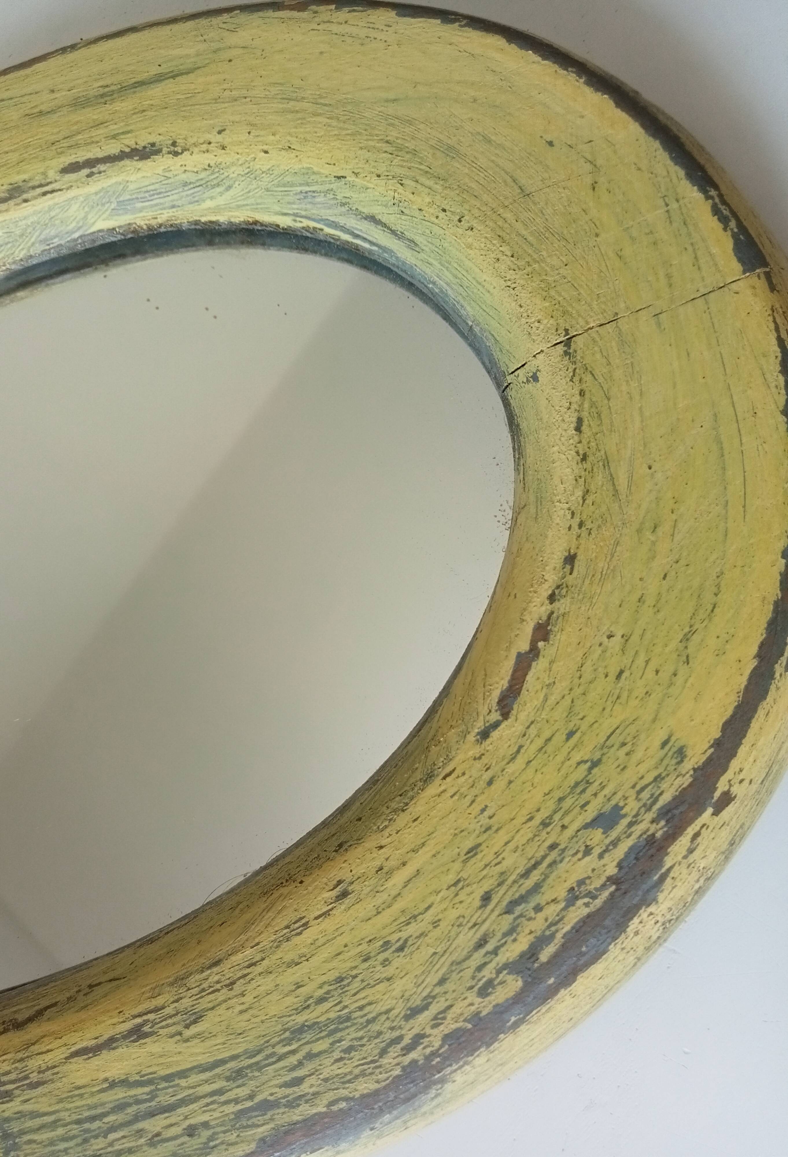 Small antique oval mirror