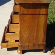 Walnut and walnut burl commode in Louis Philippe style.