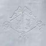 Fine linen sheet with ribbon and florets, monogrammed mr