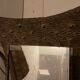 Dressing table coat rack by Roger Landault with its chair.