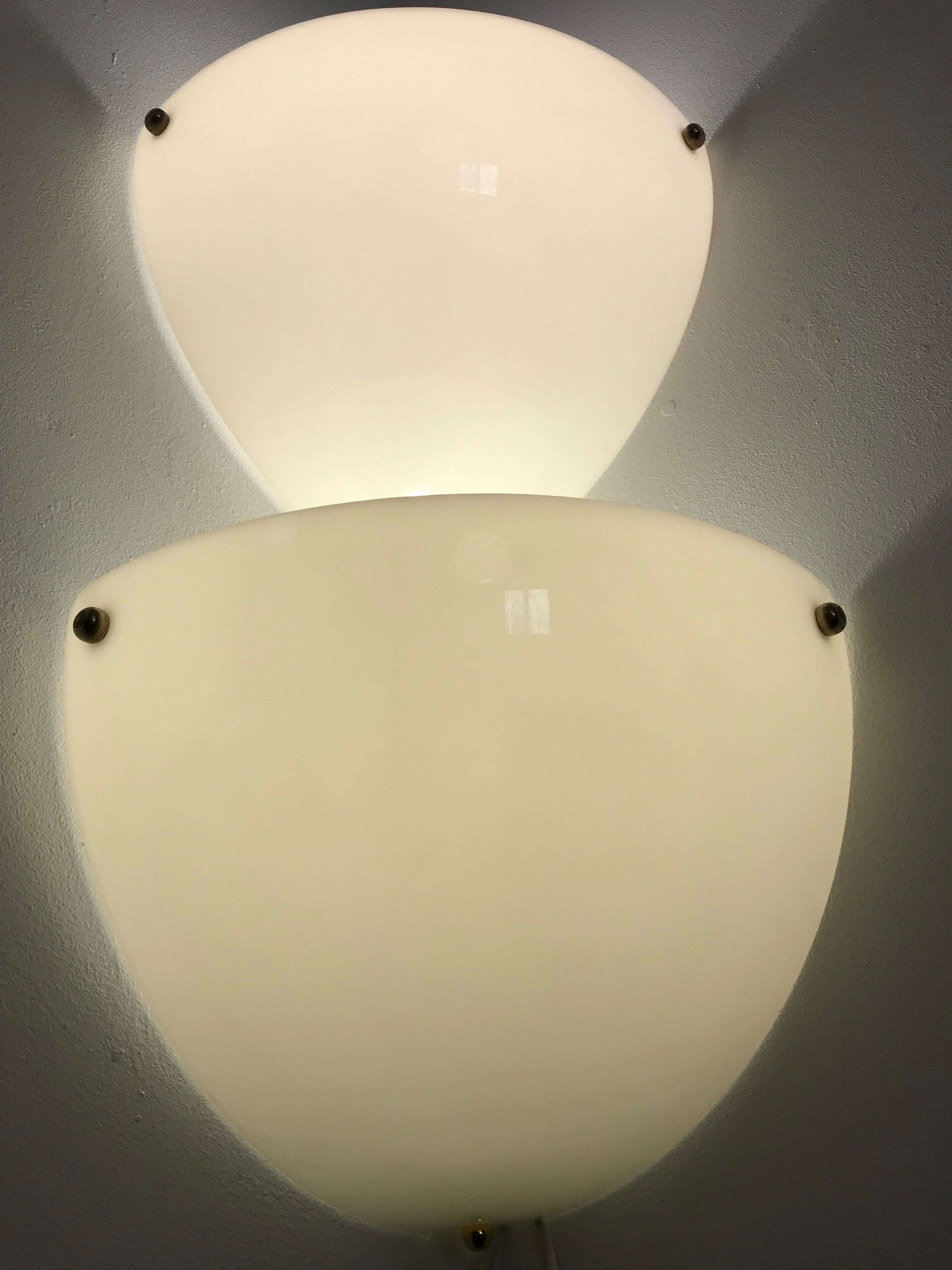 Duo of plastic corner sconces