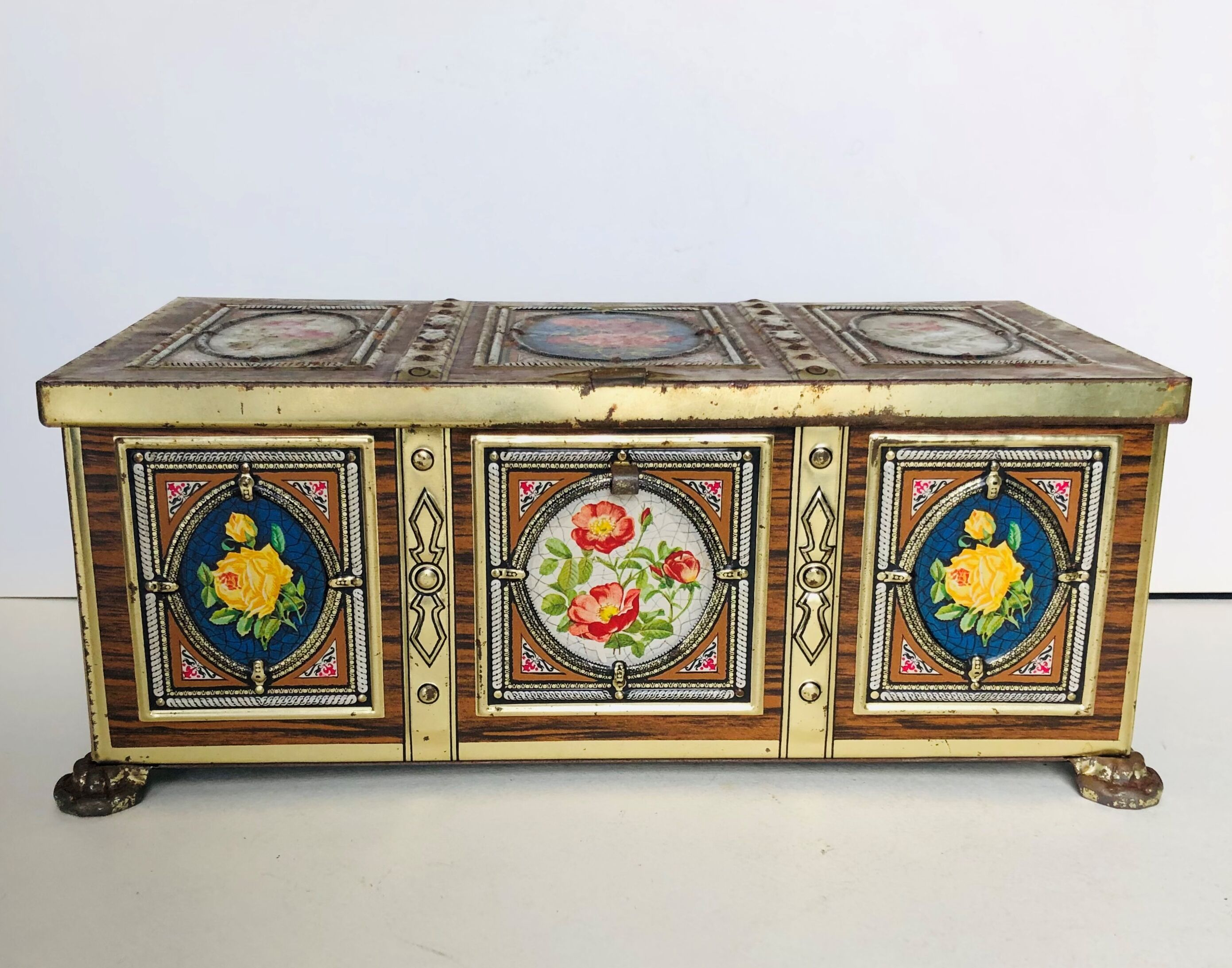 Old metal box decorated with flowers