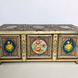 Old metal box decorated with flowers