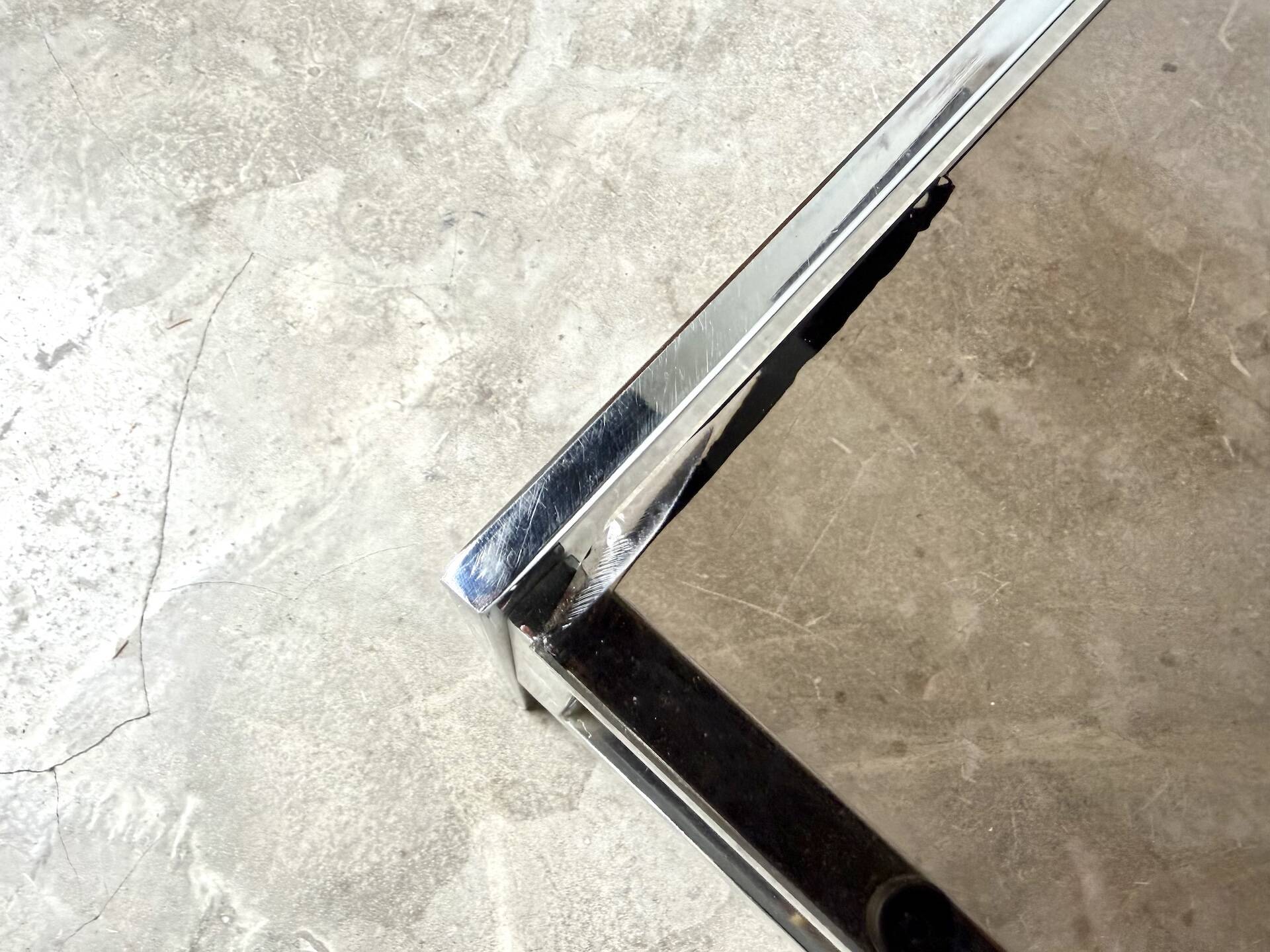 Modernist chrome and smoked glass coffee table, circa 1970