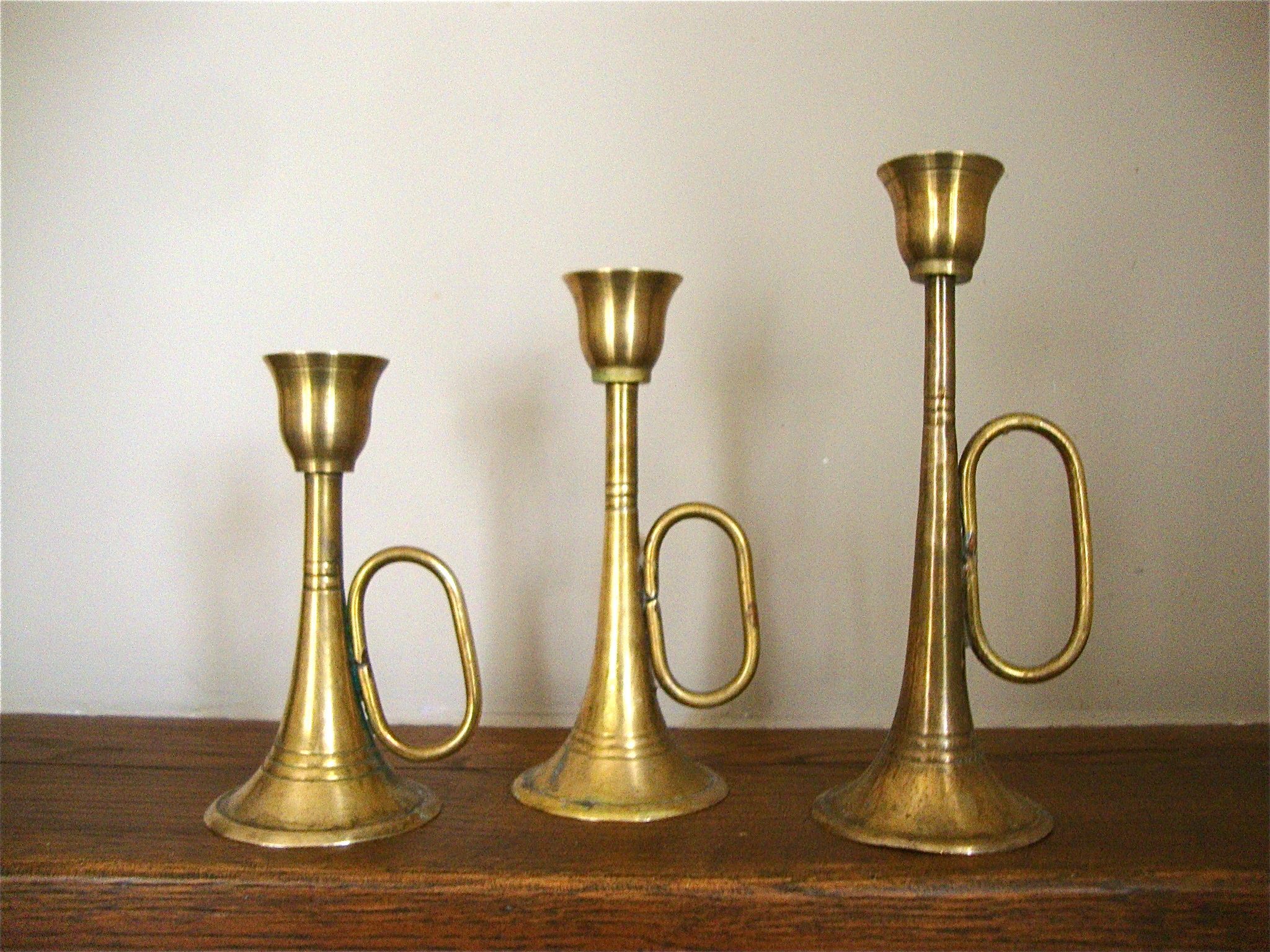 3 brass trumpet candlesticks